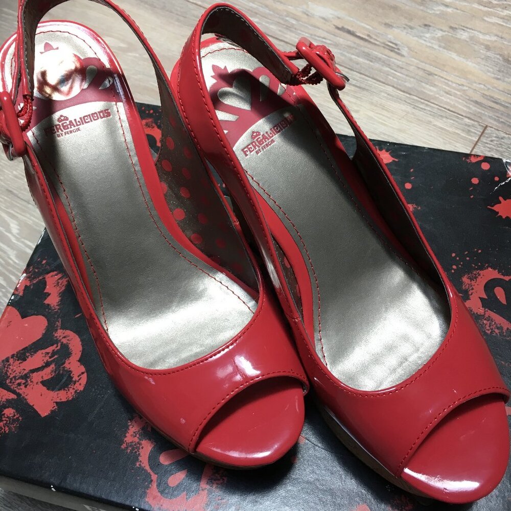 NEW. Fergalicious patent leather orange sandals. Never worn. Sz7M